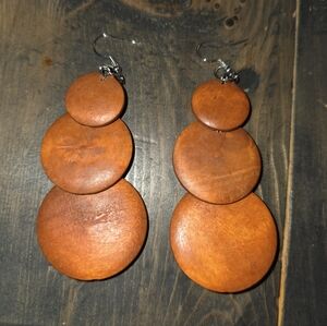 Boho-style faux wooden dangle earrings featuring a stacked circle design